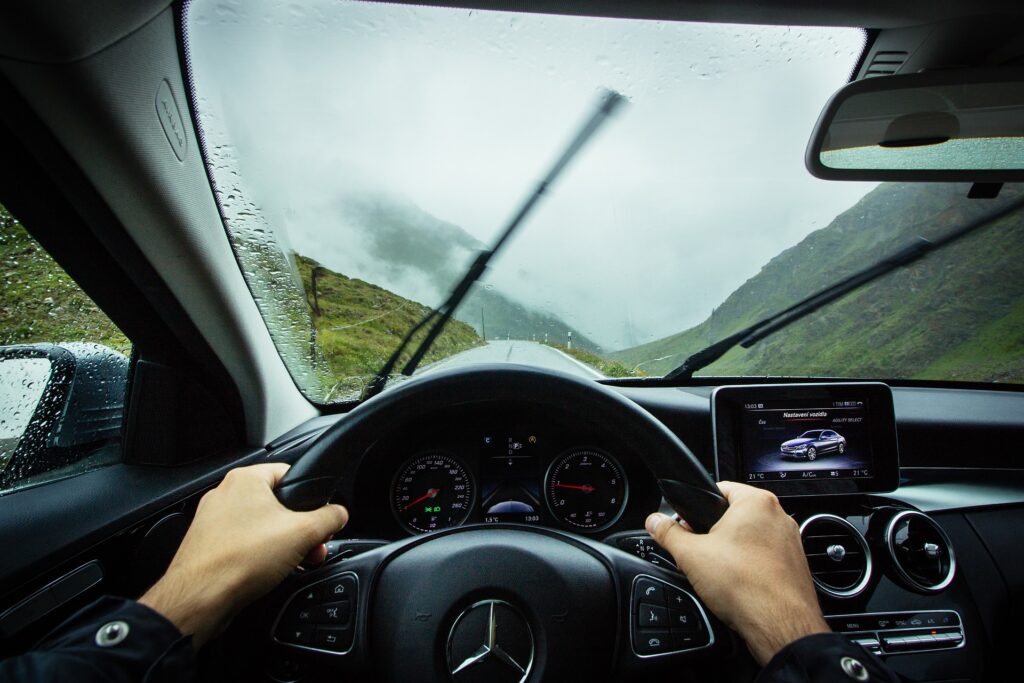 Modern dashboard with sensors visible behind windshield